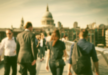 Blurred background of crowd of people on millennium bridge and st pauls cathedral in background, londonの写真素材