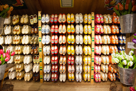 Bright yellow wooden clog, traditional Dutch shoesのeditorial素材