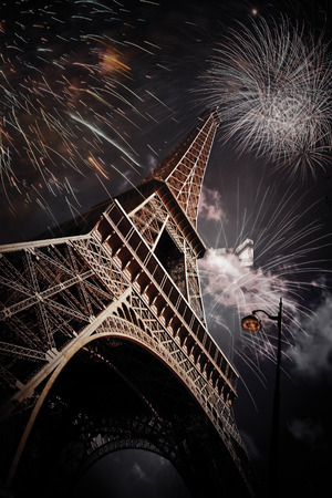 Eiffel tower (Paris, France) with fireworks - Celebrating New Year in the cityのeditorial素材