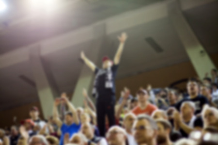 blurred background of crowd of people in a basketball court