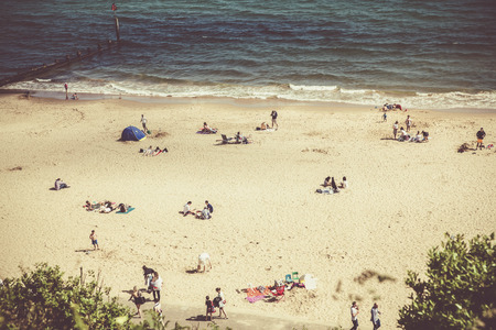 british seaside - summer holiday destination - top view of people on the beach in Bournemouth, Dorset, UKのeditorial素材
