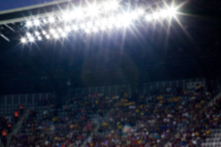 evening stadium arena soccer field defocused backgroundの写真素材