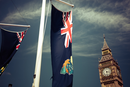 england flags in the wind in front of Big Ben, London, UKの写真素材