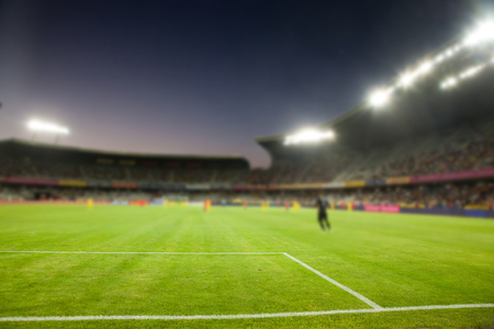 evening stadium arena soccer field defocused backgroundの写真素材
