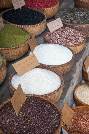 HANOI VIETNAM - AUGUST 2017: Various type of cereal grains (seeds, rice, buckwheat, oats, lentils,chickpeas, beans) on sale at Dong Xuan marketのeditorial素材