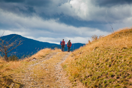trekking in beautiful autumn scene in Apuseni mountains, Carpathians, Romaniaの写真素材