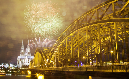 celebrating new year's eve in n Koln, Germany - fireworks around the Cologne cathedralの写真素材