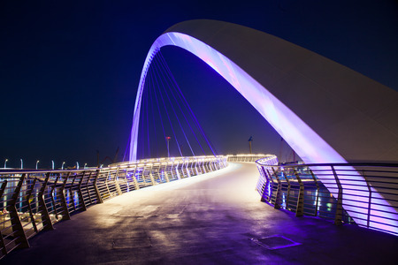 DUBAI, UAE - FEBRUARY, 2018: Dubai Water Canal arch bridge or Tolerance bridge