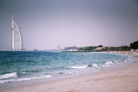 DUBAI, UNITED ARAB EMIRATES - FEBRUARY 2018 : Burj Al Arab, One of the most famous landmarks of United Arab Emirates seen from Black Palace public beach.のeditorial素材
