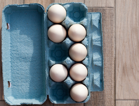beautiful big white organic eggs in tray
