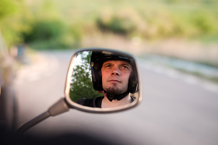 rider on a motorcycle - summer road trip on a motorbikeの写真素材