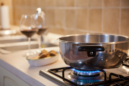 two glasses of red wine on  kitchen tableの写真素材