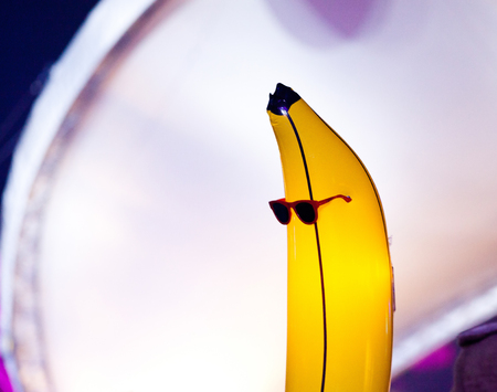 banana with sunglasses at concertの写真素材