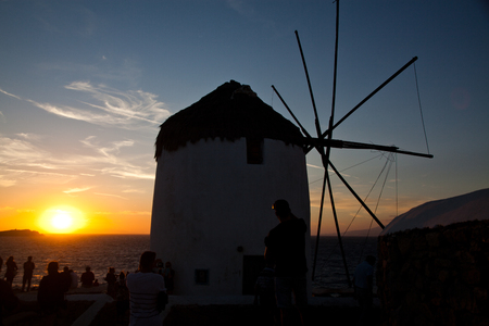 famous view  Traditional windmills on the island Mykonos, Greeceの写真素材