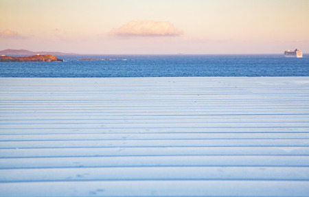 white wooden planks, sunset sky. sea