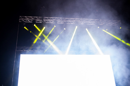 empty white board with copy space and stage lights - banner for music festival
