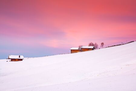 amazing winter landscape at sunrise in Alpe di Siusi. Dolomites  Italy - winter holidays destinationの写真素材
