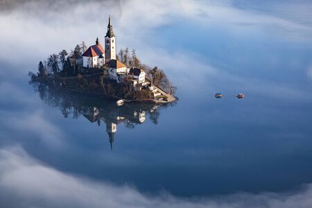 lake Bled in early morning with fog, Slovenia travelの写真素材