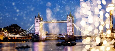 holiday lights and snowfall in London