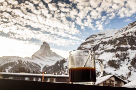 view of Matterhorn through hotel window in Zermatt