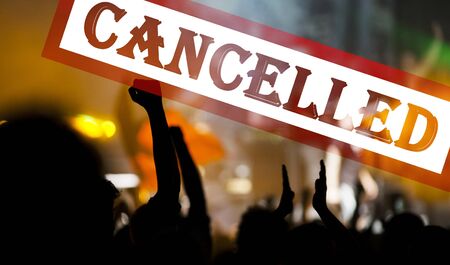 public event cancelled - crowd at concert - coronavirus measuresの写真素材