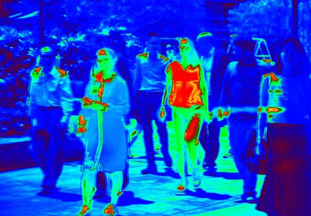 thermal scanner detecting infected people with Covid-19. Coronavirus spread control concept.の写真素材