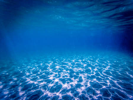 tropical blue ocean underwater background - luxury nature patternの写真素材