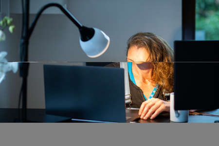 casual woman working in home officeの写真素材