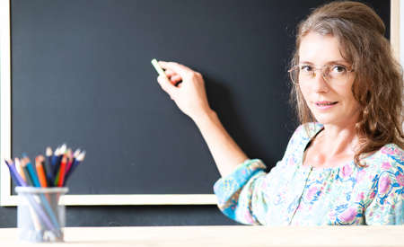 teacher welcoming students back to schoolの写真素材