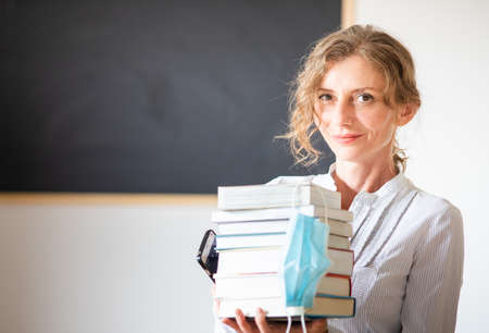 school teacher with medical mask coronavirusの写真素材
