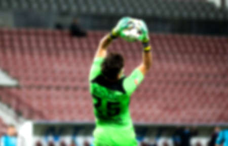 soccer game background goalkeeper catching football