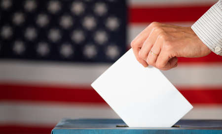 elections in the US - voting ballot and American flag