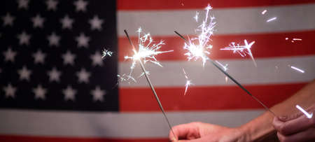 sparkles in front of  American flagの写真素材