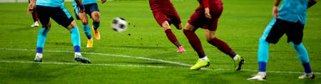 banner of soccer game players fighting for footballの写真素材