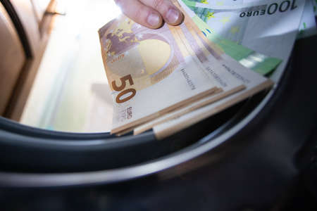 euro banknotes in washing machine