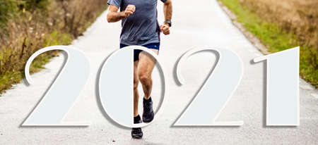 man running to 2021 new yearの写真素材