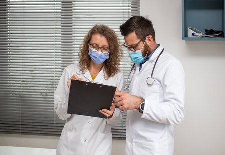 two doctors discussing a diagnostics