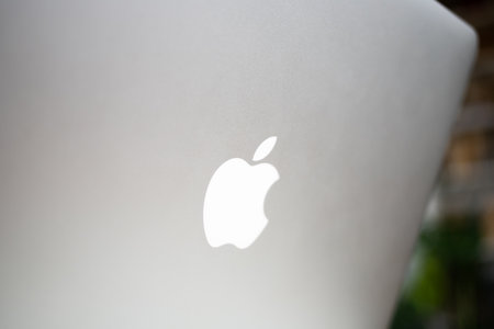 CLUJ-NAPOCA, ROMANIA - APRIL 7, 2021: Apple laptop in a home.のeditorial素材