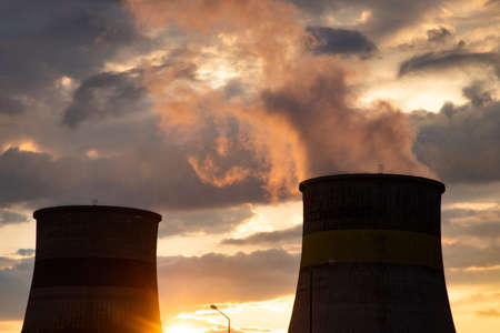 factory smoke coming out of chimney pollution and global warmingの写真素材