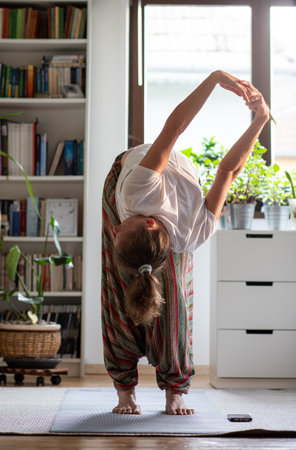 woman doing yoga at homeの写真素材