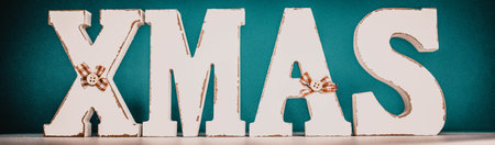 white xmas letters on blue