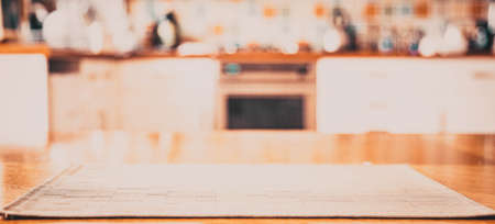 blurred kitchen interior with napkin on tableの写真素材