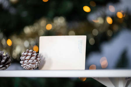 pine cones and Christmas lights holiday backgroundの写真素材