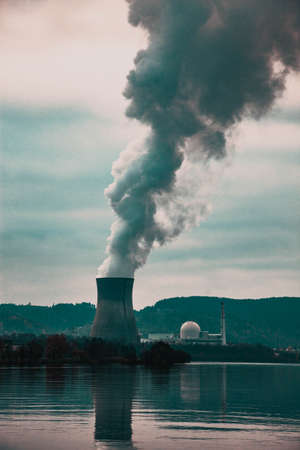 smoke coming out of factory chimney