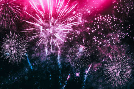 fireworks in cyberpunk pink neon lights at New Year and copy space - abstract holiday backgroundの写真素材