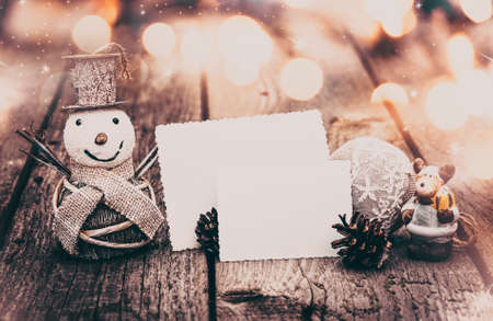 christmas decorations on golden bokeh background with copy space - holiday lights
