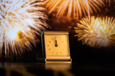clock at midnight and fireworks  New Year's eve celebrationの写真素材