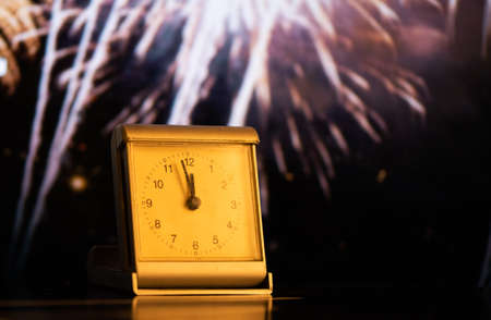 clock at midnight and fireworks  New Year's eve celebrationの写真素材