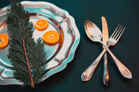 flat lay of festive Christas table arrangement with silverwareの写真素材