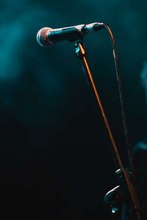 concert and festival background microphone is stage lightsの写真素材